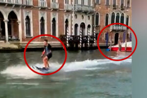 Venecia multa a los turistas que surfearon el Gran Canal