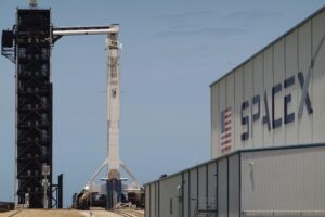 CAPE CANAVERAL, FLORIDA - MAY 29: The SpaceX Falcon 9 rocket with the Crew Dragon spacecraft attached is seen on launch pad 39A at the Kennedy Space Center on May 29, 2020 in Cape Canaveral, Florida. After scrubbing the first attempt at launch NASA astronauts Bob Behnken and Doug Hurley are scheduled to try again on Saturday and if successful would be the first people since the end of the Space Shuttle program in 2011 to be launched into space from the United States.   Joe Raedle/Getty Images/AFP