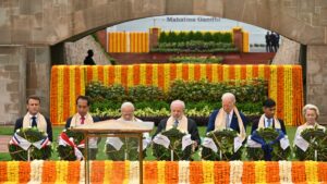 G20 leaders pay respects at Gandhi memorial as they wrap up Indian summit and hand over to Brazil