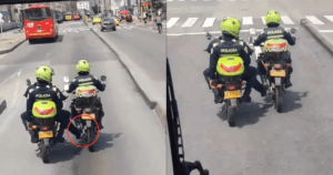 Policía en moto que remolcó a otros dos patrulleros con su pie por el carril de Transmilenio es blanco de críticas