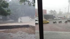 video de lluvia y un camión arrastrado por arroyo en Soledad