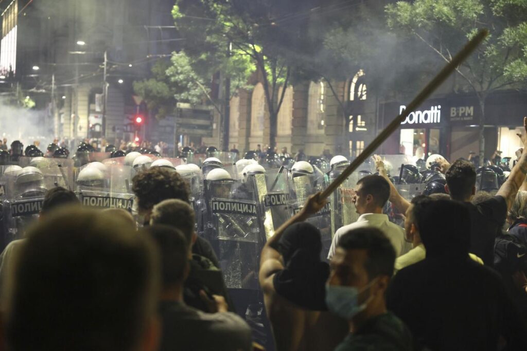 Riot police block anti-government protesters at the end of a rally pressing for an early election after nearly eight months of almost daily anti-corruption demonstrations that have shaken the populist government of President Aleksandar Vucic, in Belgrade, Serbia, Saturday, June 28, 2025. (AP Photo/Marko Drobnjakovic)