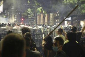 Riot police block anti-government protesters at the end of a rally pressing for an early election after nearly eight months of almost daily anti-corruption demonstrations that have shaken the populist government of President Aleksandar Vucic, in Belgrade, Serbia, Saturday, June 28, 2025. (AP Photo/Marko Drobnjakovic)