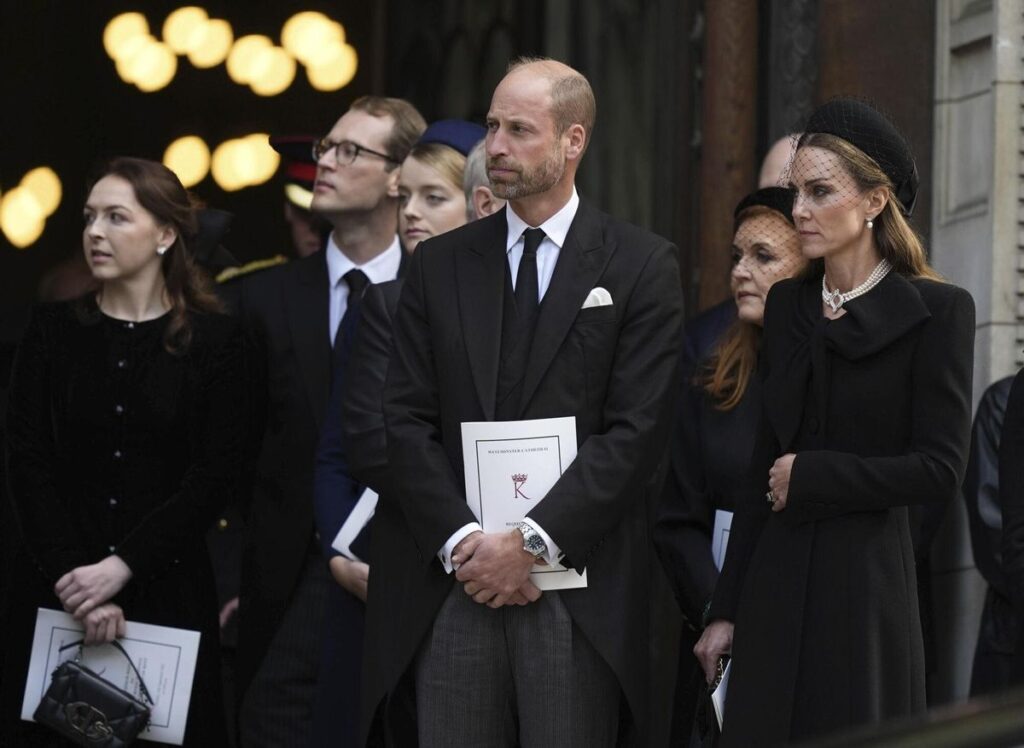 Britain's Prince William and Kate, Princess of Wales, leave after the Requiem Mass service for the Duchess of Kent, at Westminster Cathedral, in London, Tuesday, Sept. 16, 2025. (Jordan Pettitt/Pool Photo via AP). POOL PHOTO