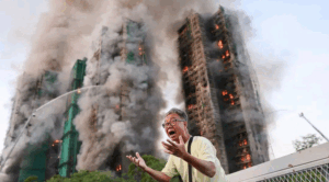 Mueren 13 personas en incendio de apartamentos en Hong Kong