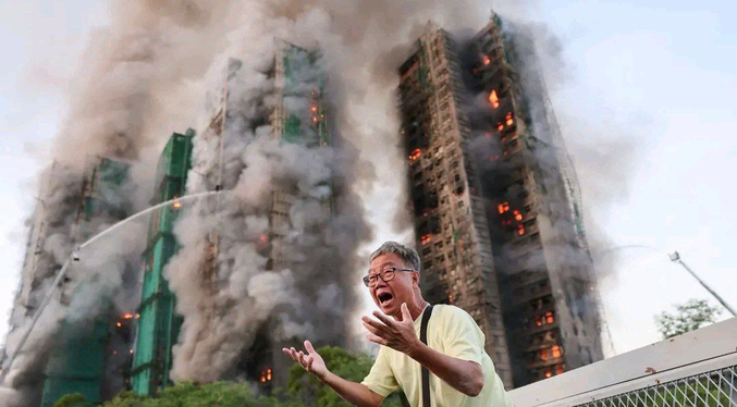 Mueren 13 personas en incendio de apartamentos en Hong Kong