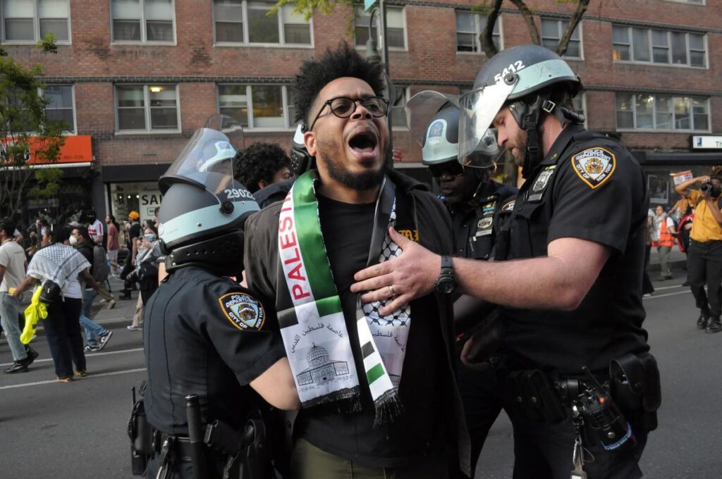 07/05/2024 May 7, 2024, New York, United States: Members of the New York City Police Department arrest a pro-Palestine demonstrator during a march. Pro-Palestine demonstrators marched in Manhattan, New York City condemning the Israel Defense Forces' military operations in Gaza. Demonstrators marched to the Fashion Institute of Technology where some students and protesters have been holding a sit-in protest, forming a ''Gaza Solidarity Encampment'' outside the campus museum. The encampment was inspired by a similar encampment that began at Columbia University last month, which was dismantled by the New York City Police Department last week. The march took place after the IDF launched strikes on the eastern section of the southern city of Rafah in Gaza. The IDF also captured a border crossing in Rafah between Gaza and Egypt. Israeli Prime Minister Benjamin Netanyahu said the IDF will launch an invasion of Rafah. More than half of Gaza's 2.3 million population are sheltered in the